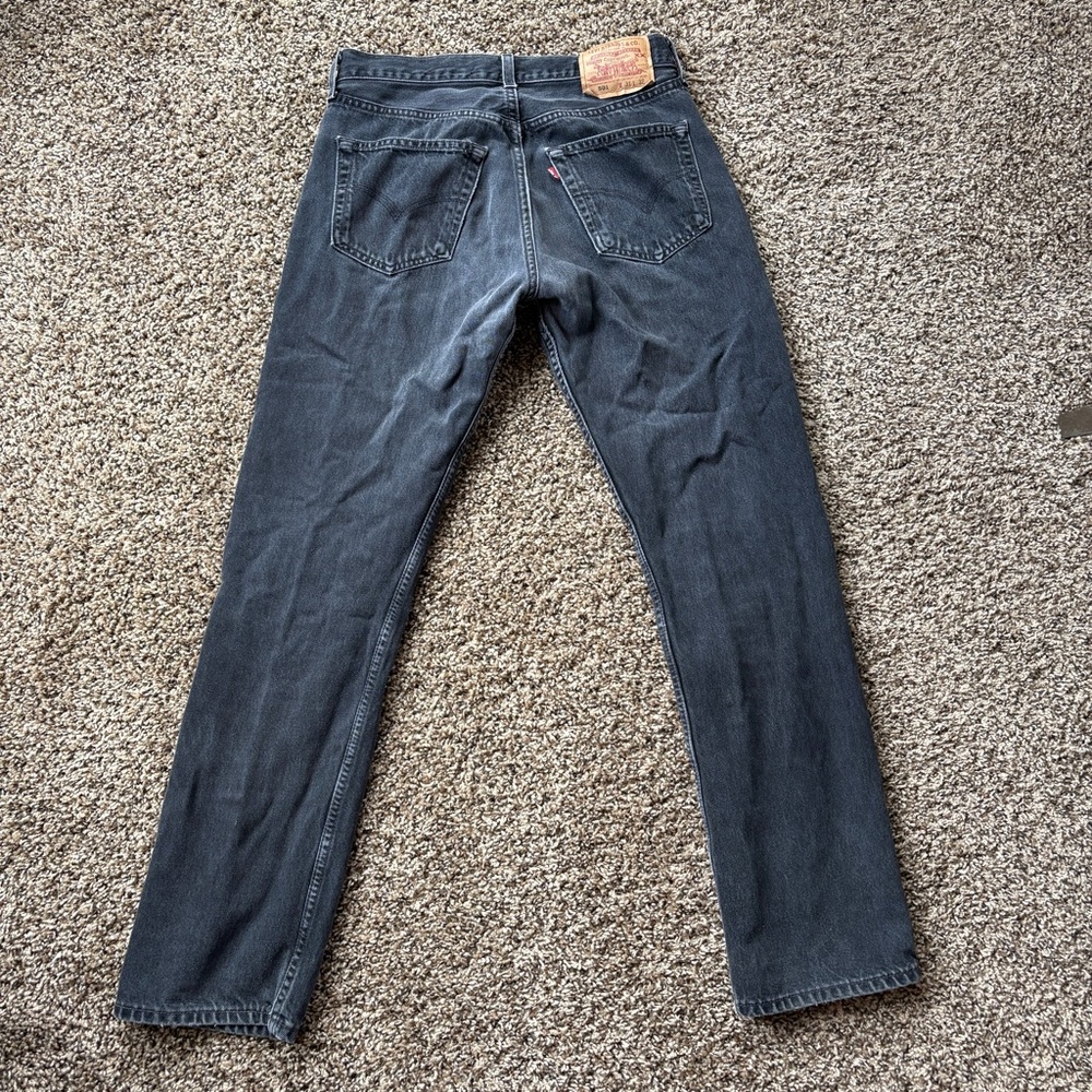 Vintage Levi's 501 black faded button fly jean